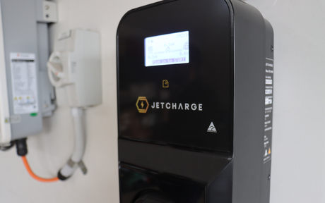 A ChargeMate wall mounted on to a garage wall.